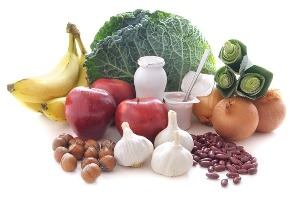 Probiotic (or prebiotic) rich foods including pulses, nuts, fruit and milk products, good for immunity and the gut. Image Copyright: Pixelbliss / Shutterstock