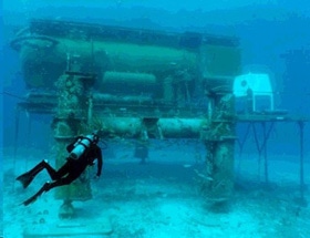 A diver approaches the Aquarius undersea research laboratory.