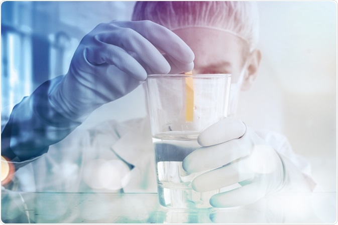 Litmus strips for measurement of acidity. Image Credit: Guschenkova / Shutterstock