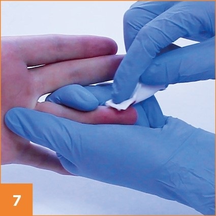 Step 7 in taking a blood prick
