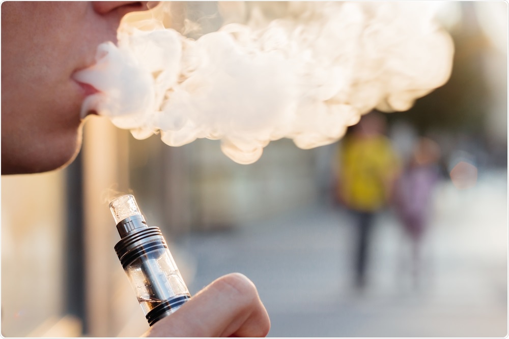 young person smoking e-cigarette
