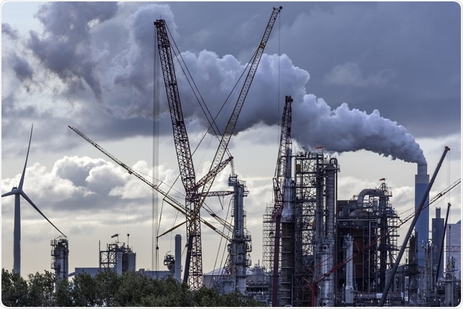 Industrial Pollution - an industrial skyline in Rotterdam - Netherlands. Image Credit: Steve Allen / Shutterstock