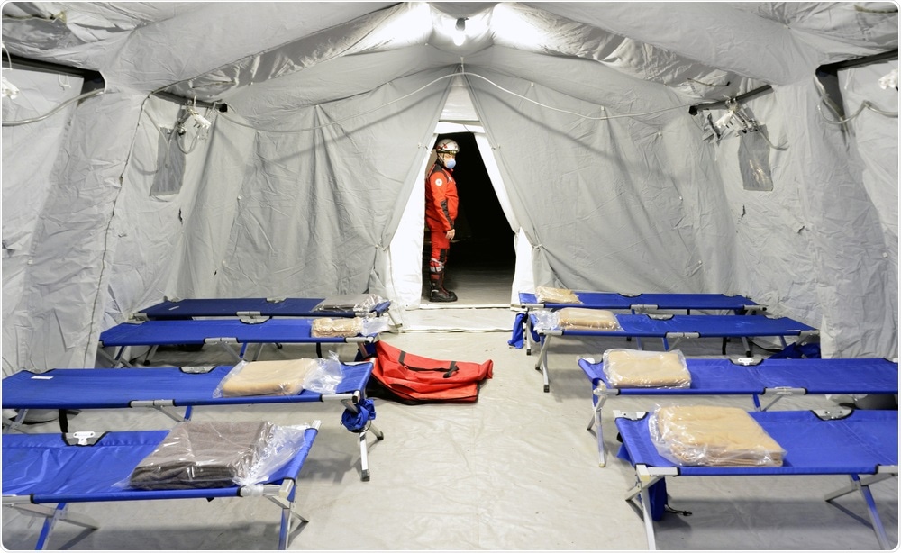 LOMBARDIA, ITALY - FEBRUARY 26, 2020: Hospital field tent for coronavirus. Image Credit: faboi / Shutterstock