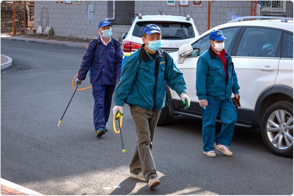 COVID-19 Disinfection squad in Beijing, China. Image Credit: Openfinal / Shutterstock
