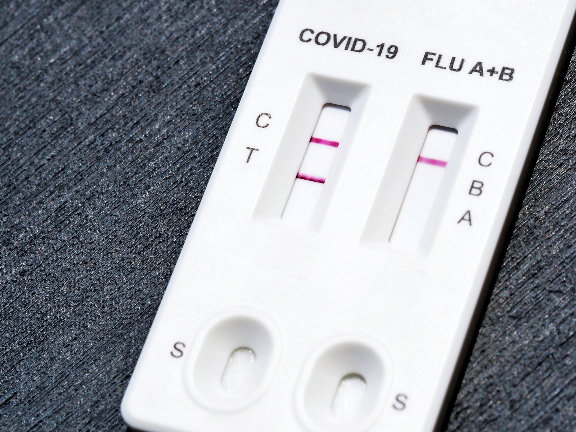 Study: Genetic risk factors for COVID-19 and influenza are largely distinct. PhotoRedHeart / Shutterstock